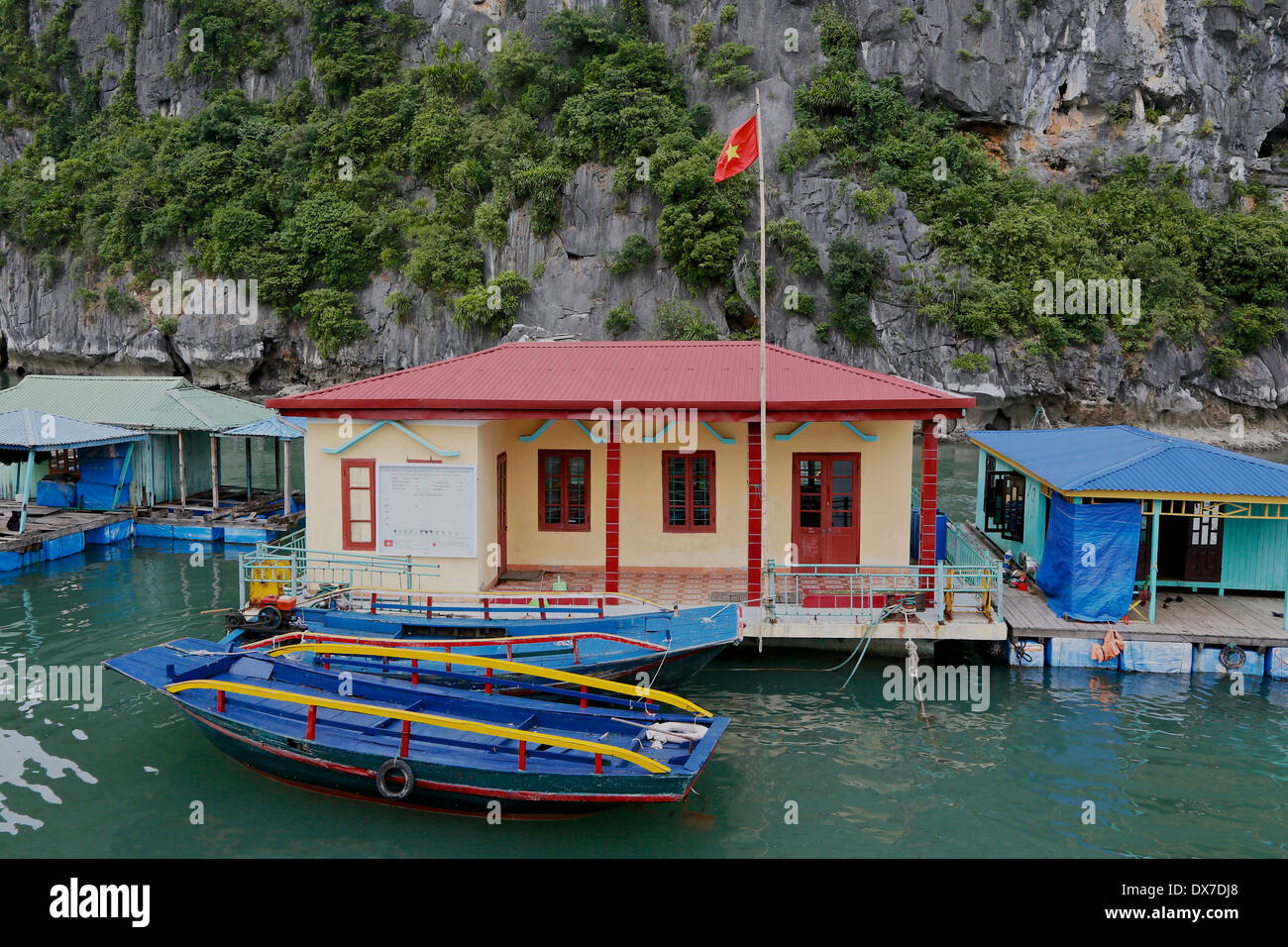 Floating village schoolhouse  in Ha Long Bay just off Dau Go  island, Ha Long Bay, Bay of Tonkin, Vietnam, Southeast Asia Stock Photo