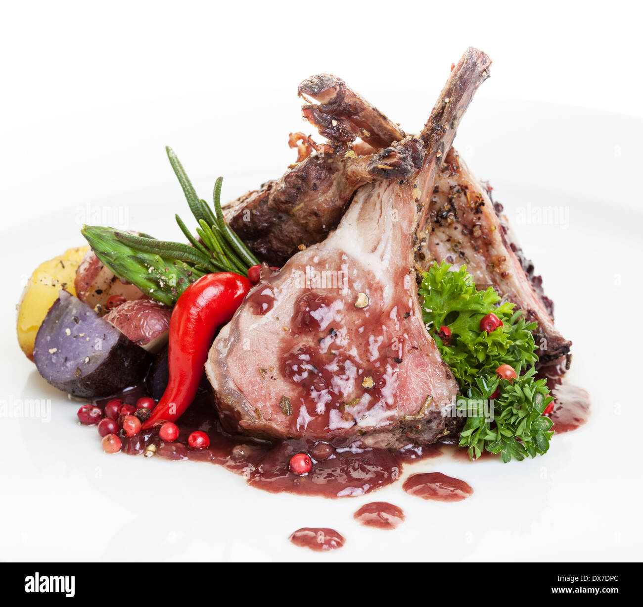 Roasted Lamb Chops with Vegetables,potato and asparagus.focus on the