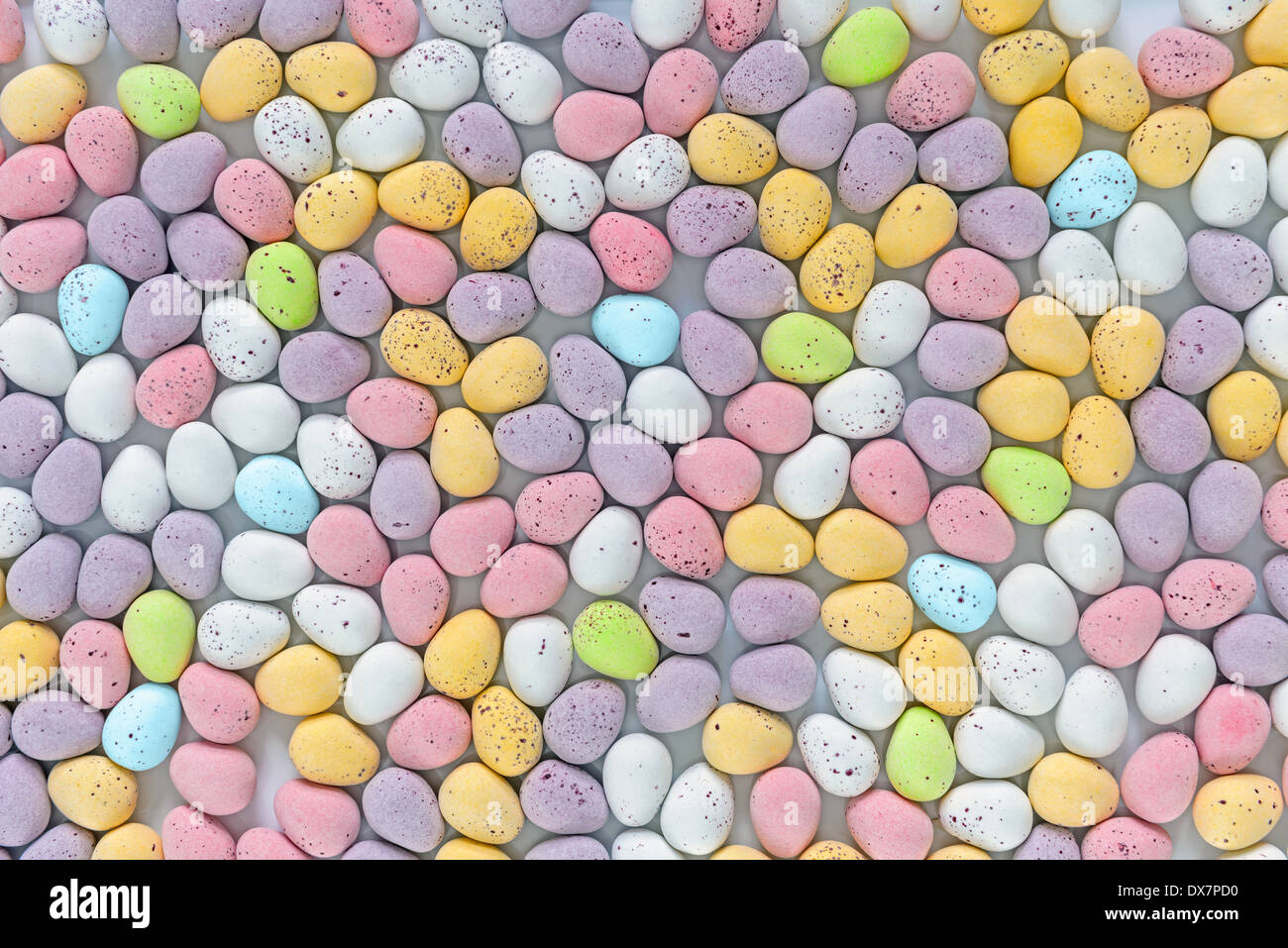 Lots of candy covered multi coloured mini chocolate Easter eggs Stock