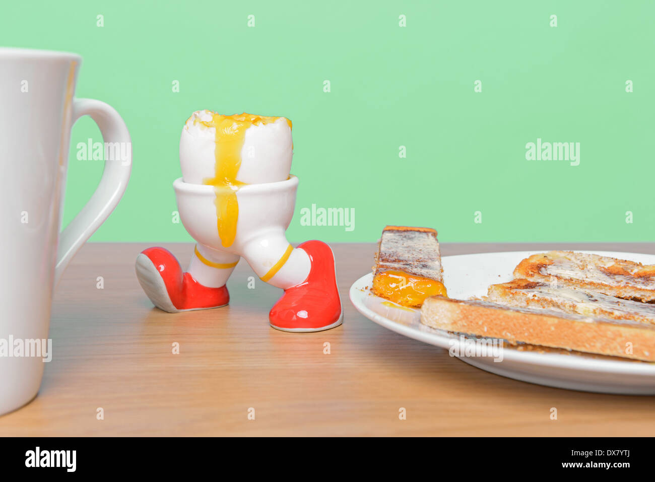 Boiled egg and toast breakfast with a cup of coffee to start the day Stock Photo