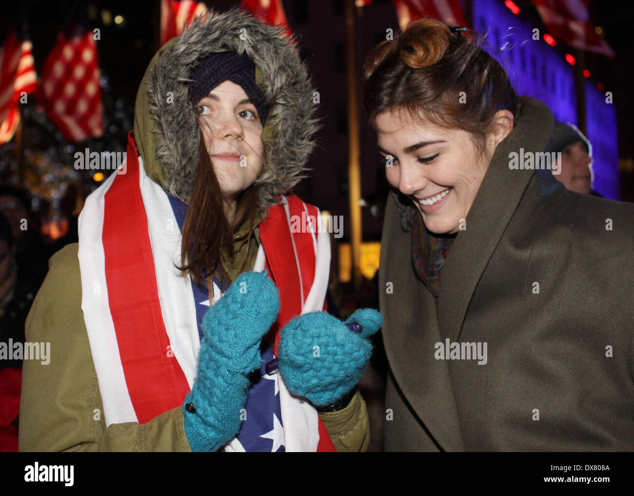 Supporters of Barack Obama gather outside New York City's Rockefeller ...