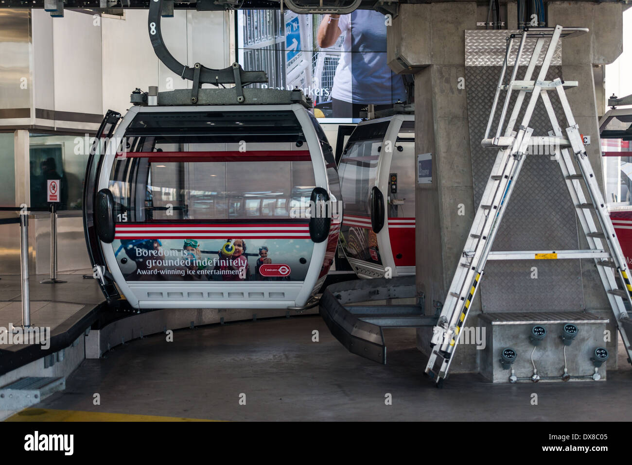 Emirates Air Line Cable Car crosses River Thames between the O2, North ...