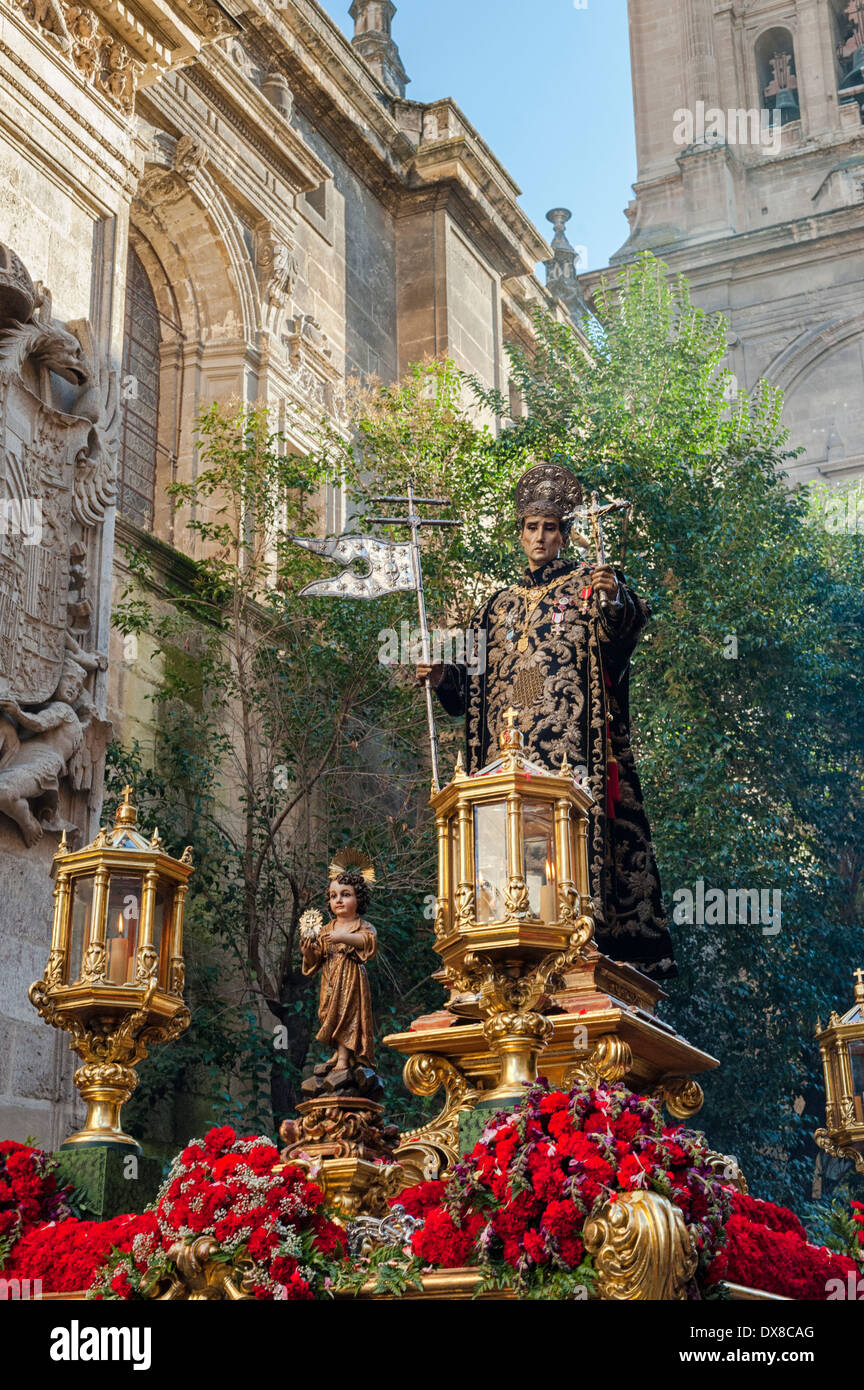 Religious effigy of a saint being carried through the streets of Granada, Spain Stock Photo