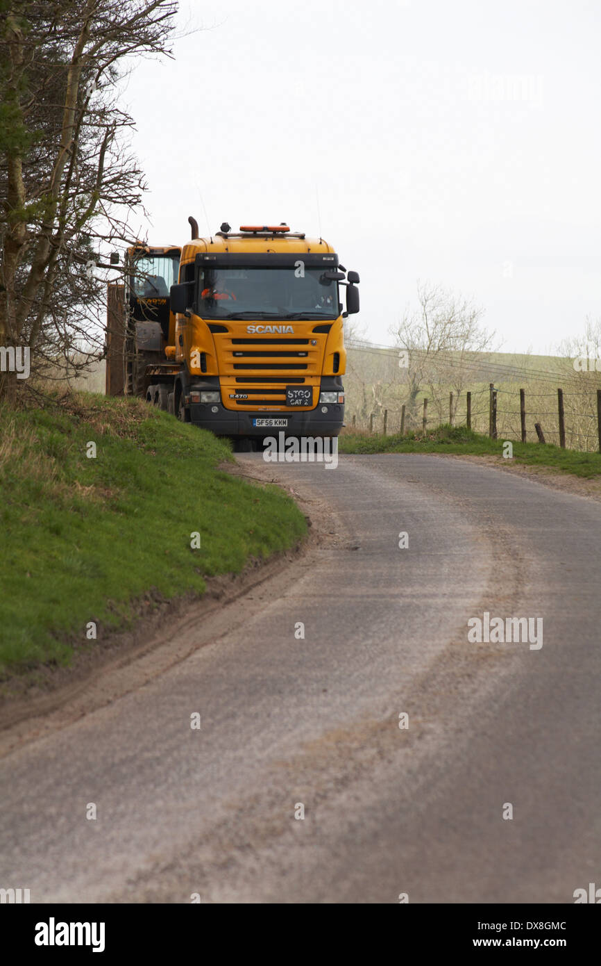 HGV vehicle driving along country lane at Dorset in March Stock Photo