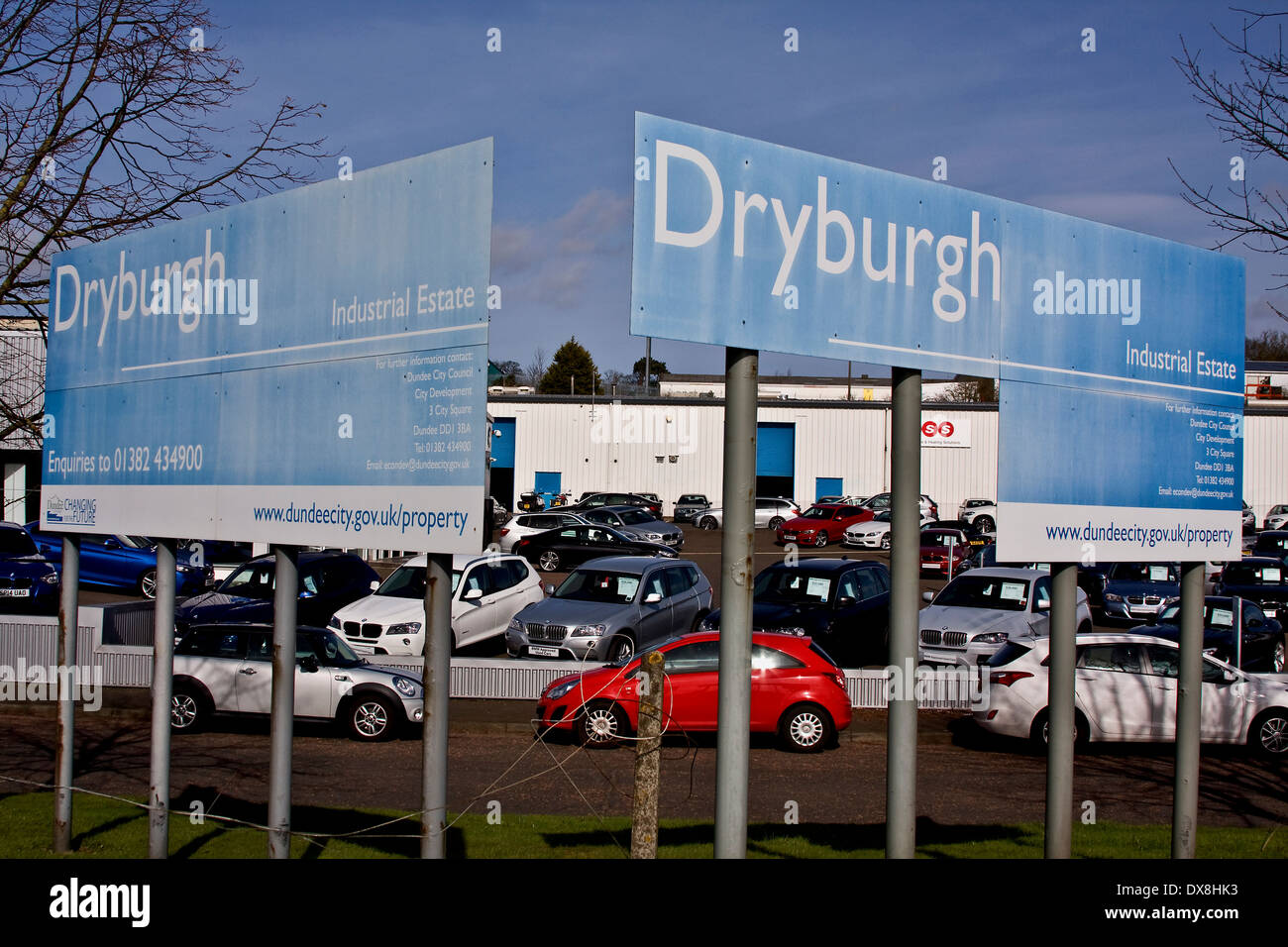 Dryburgh Industrial Estate signs in front of Arnold Clark Car showroom