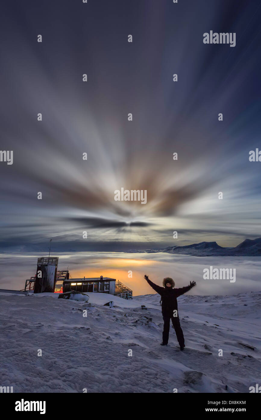 Woman happy to be at the Abisko Sky Station in Abisko, Lapland, Sweden Stock Photo