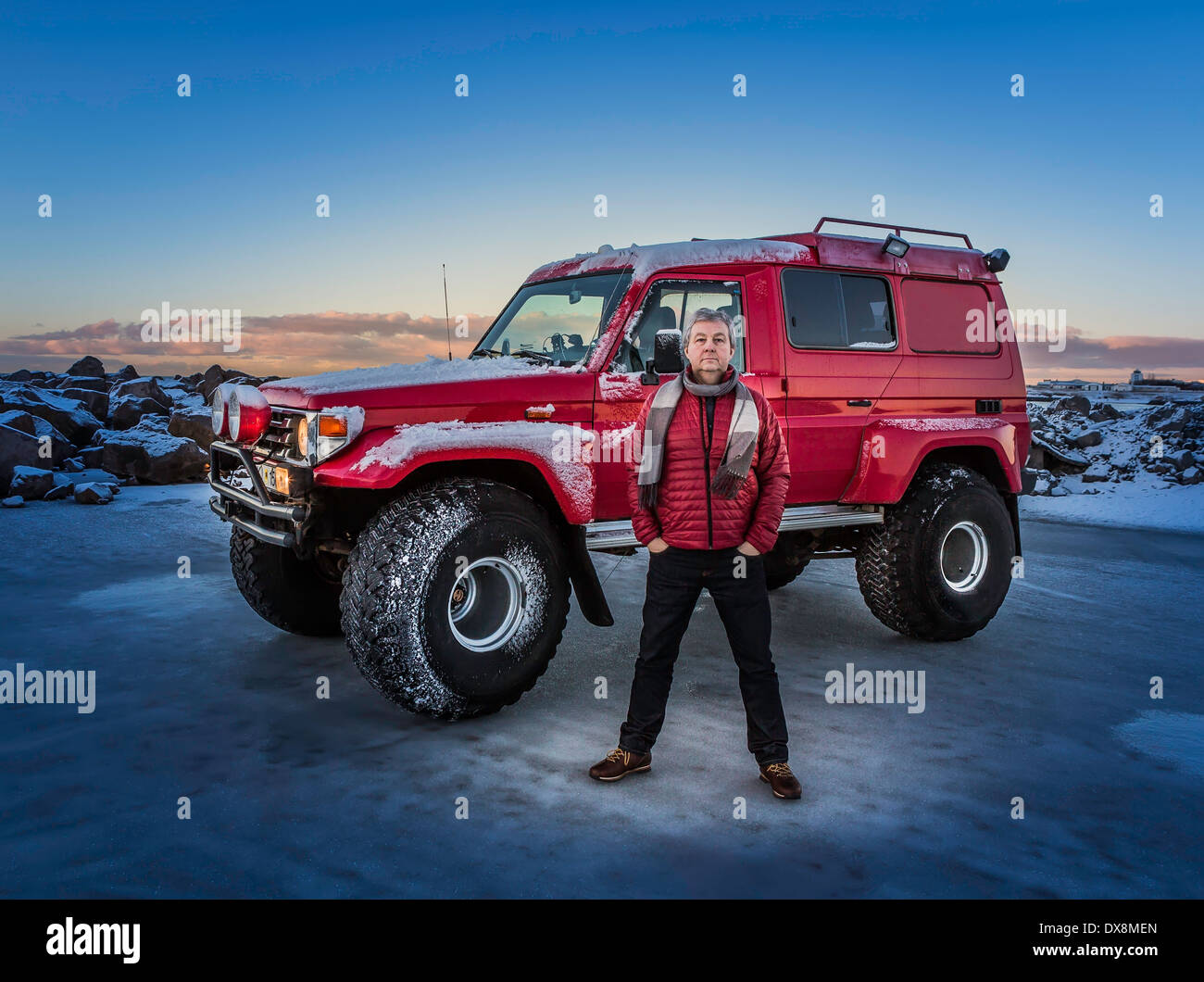 Man in front of a modified Jeep, Iceland Stock Photo