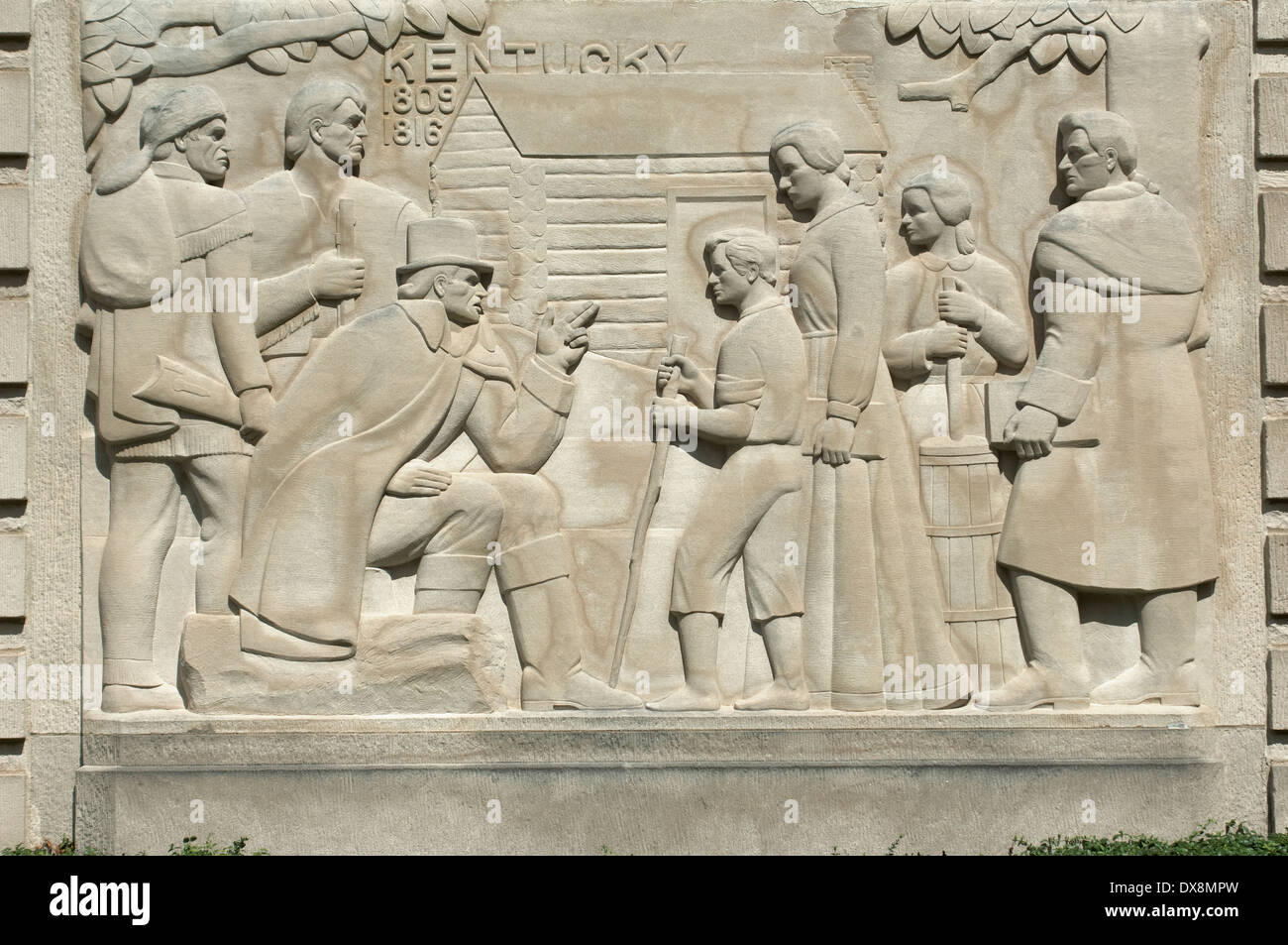 Lincoln as a child in Kentucky, limestone bas-relief at the Lincoln Boyhood National Memorial, Indiana. Digital photograph Stock Photo
