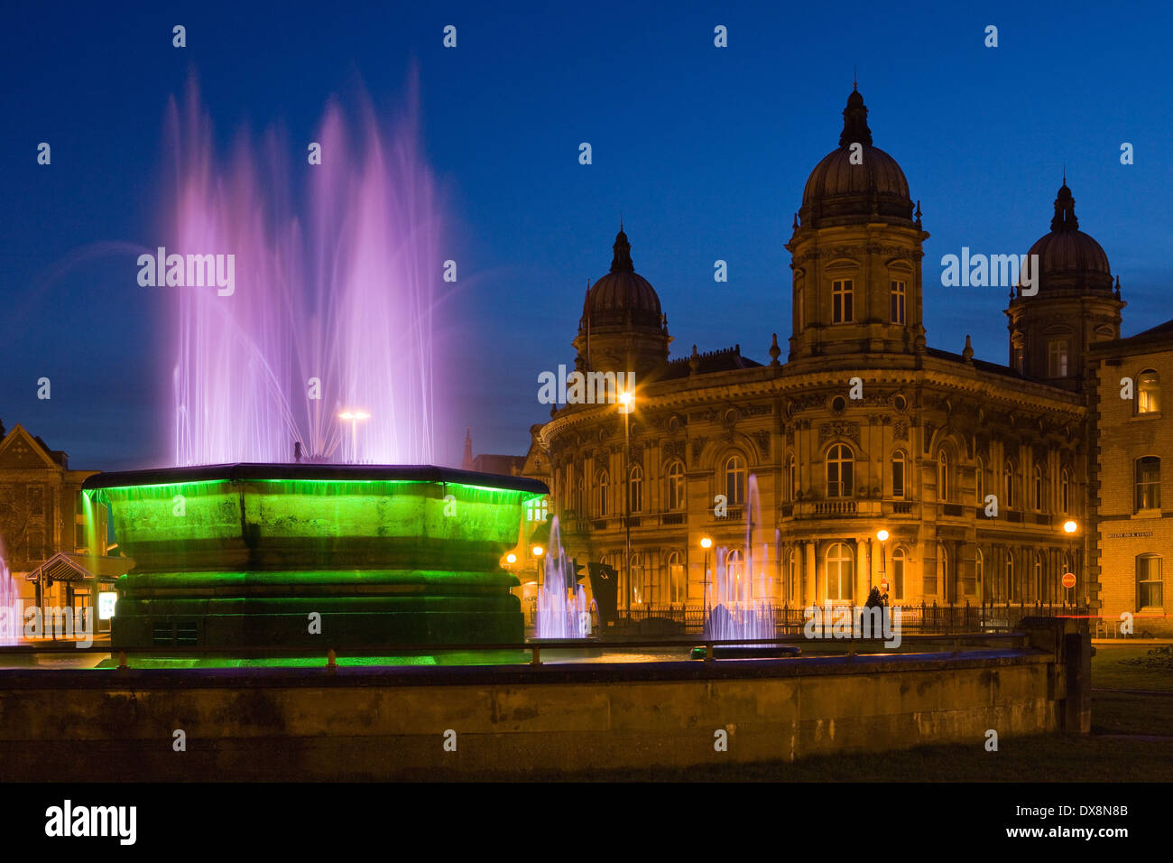 The Queens Gardens water fountain and the Maritime Museum in Hull (Kingston-upon-Hull) in East Yorkshire at dusk. Stock Photo