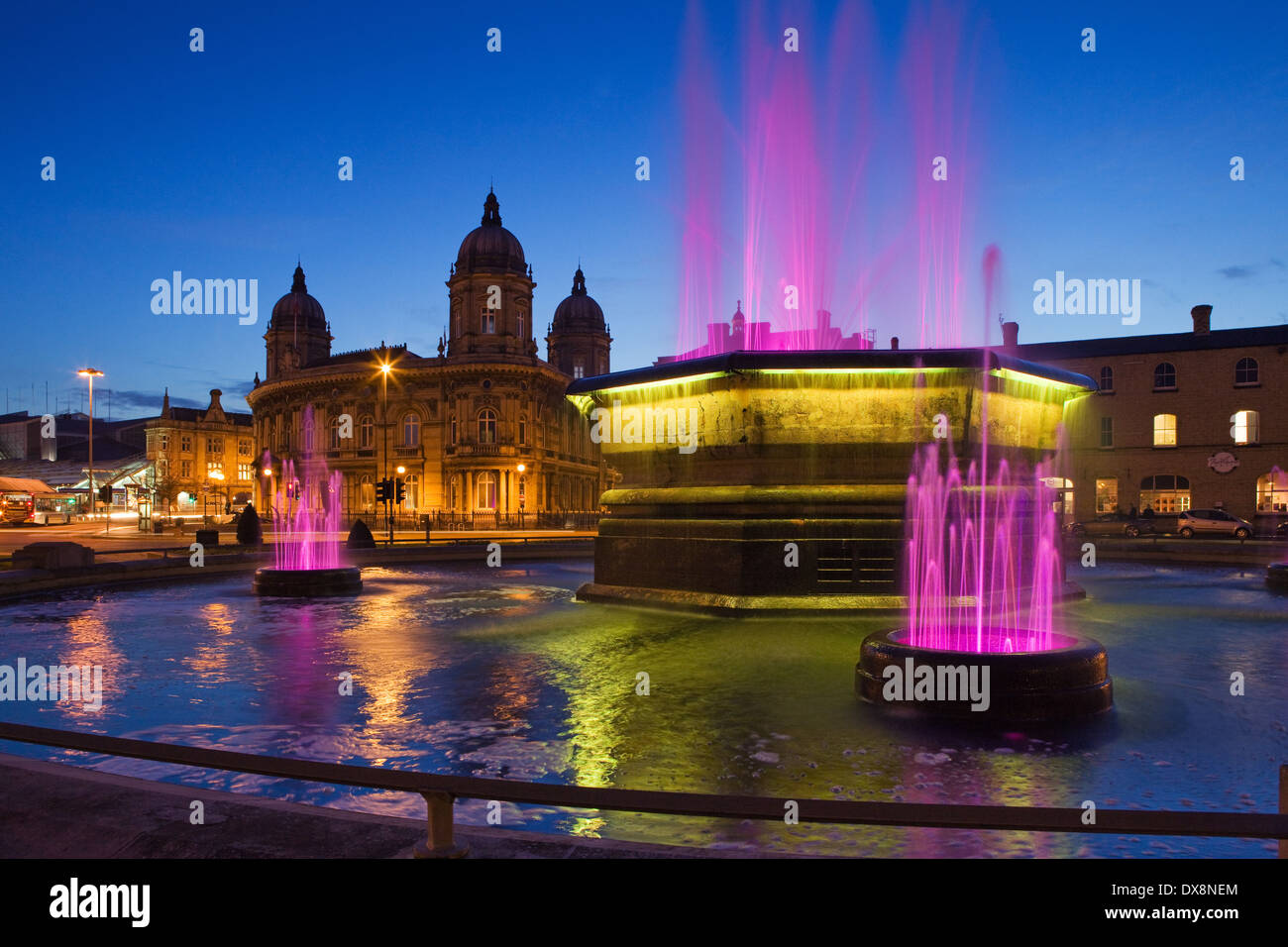 The Queens Gardens water fountain and the Maritime Museum in Hull (Kingston-upon-Hull) in East Yorkshire at dusk.. Stock Photo