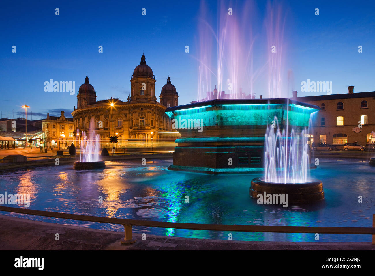 The Queens Gardens water fountain and the Maritime Museum in Hull (Kingston-upon-Hull) in East Yorkshire at dusk. Stock Photo