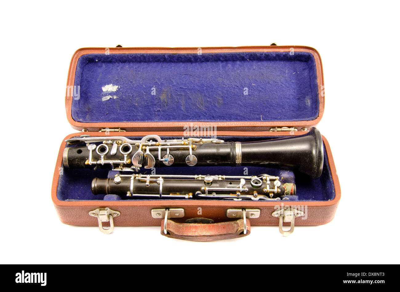 old used musical instrument clarinet in ancient case isolated on
