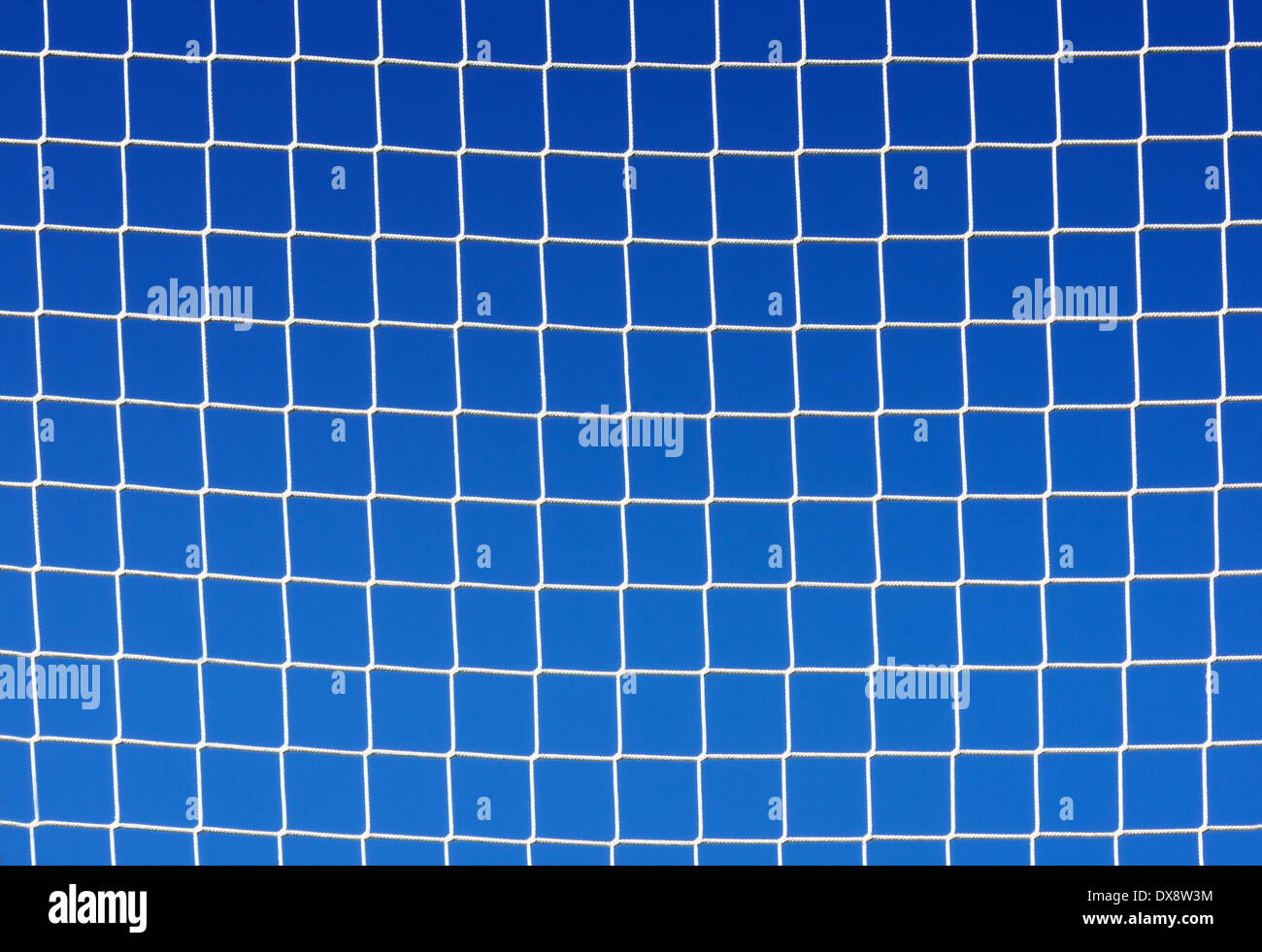 background of soccer net against blue sky Stock Photo