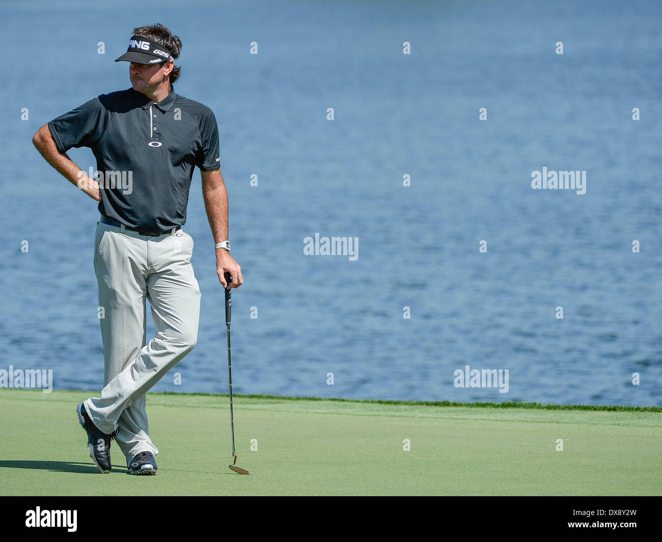 Orlando, Florida, USA. 20th March 2014. Bubba Watson on the par 5 6th green after hitting 2 tee shots into the water during first round golf action of the Arnold Palmer Invitational presented by Mastercard held at Arnold Palmer's Bay Hill Club & Lodge in Orlando, FL Credit:  Cal Sport Media/Alamy Live News Stock Photo