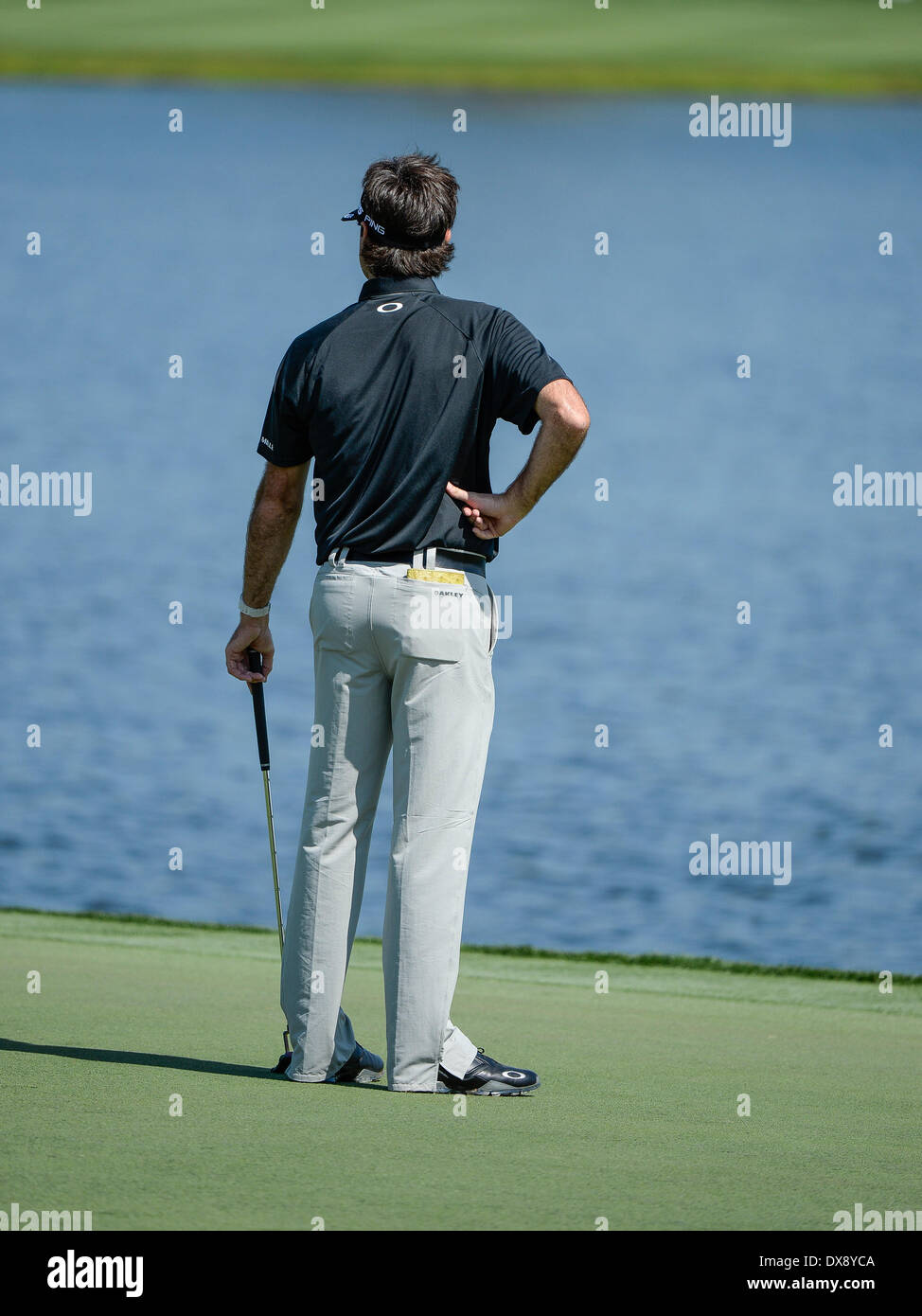 Orlando, Florida, USA. 20th March 2014. Bubba Watson looks back from the par 5 6th green after hitting 2 tee shots into the water during first round golf action of the Arnold Palmer Invitational presented by Mastercard held at Arnold Palmer's Bay Hill Club & Lodge in Orlando, FL Credit:  Cal Sport Media/Alamy Live News Stock Photo