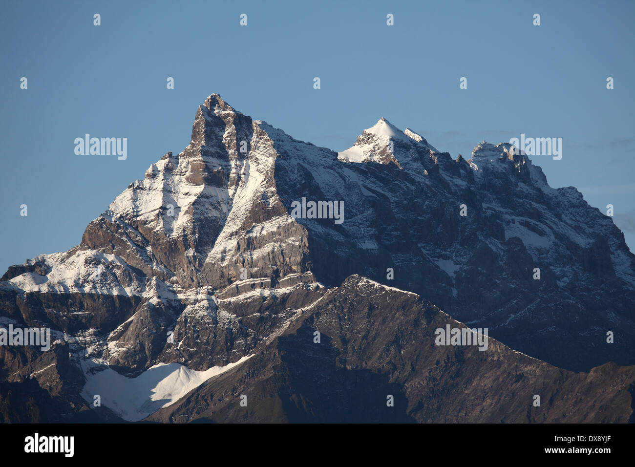 The multi-summited Dents du Midi mountain in Switzerland. Stock Photo