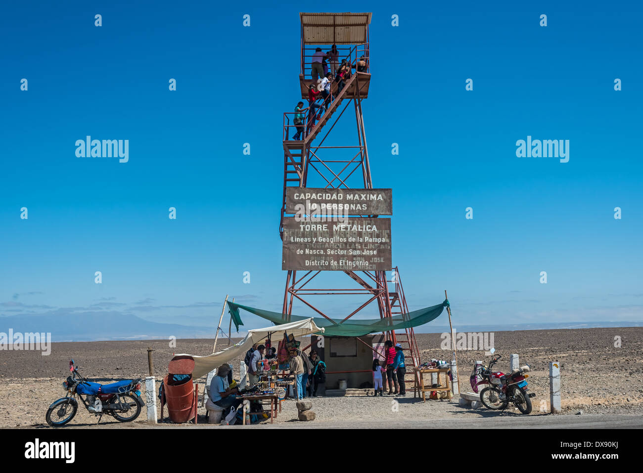 Nazca, Peru - July 31, 2013: people at the nazca lines observation tower in the peruvian coast at Ica Peru on july 31, 2013 Stock Photo