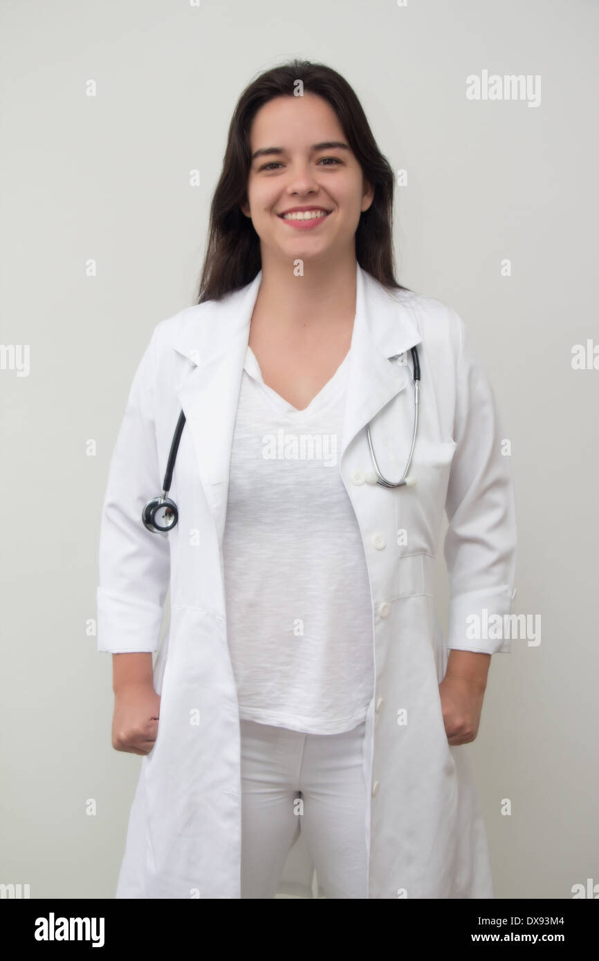 Female doctor smiling in the white background Stock Photo