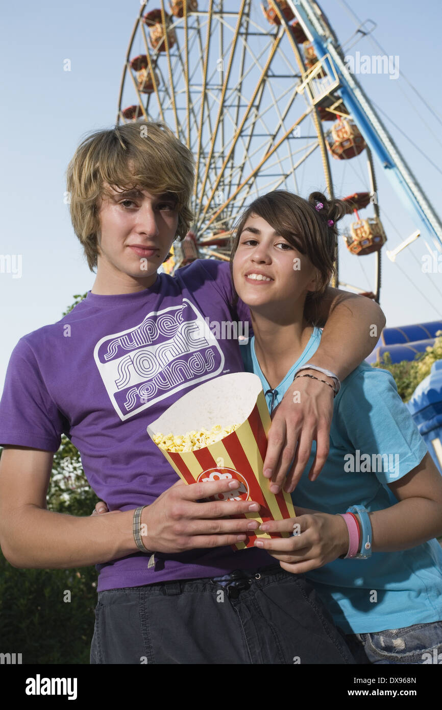 Teenage couple hugging in park hi-res stock photography and images - Alamy