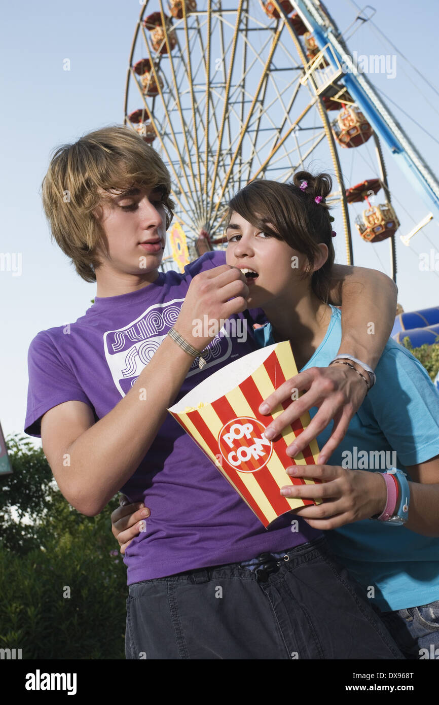 Teenage couple hugging in park hi-res stock photography and images - Alamy