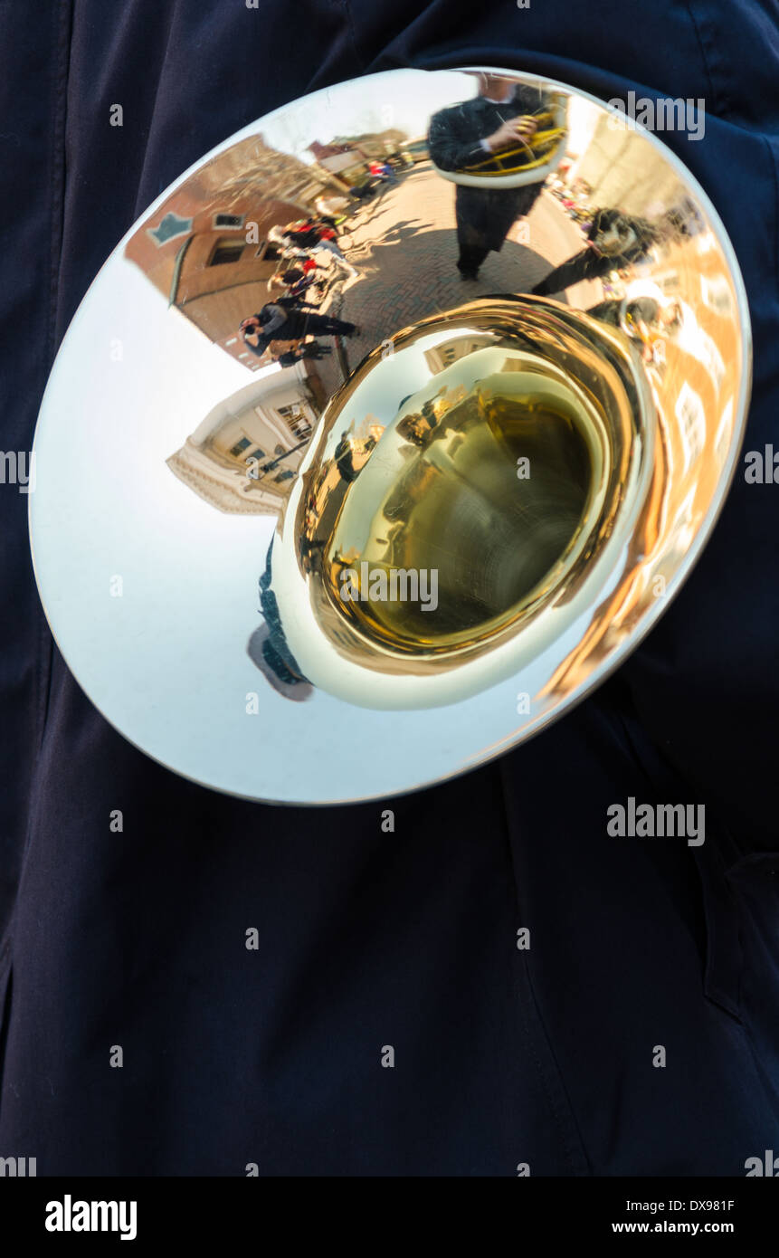 Reflections in a brass instrument during a military band parade on St Patrick's Day in Annapolis, MD. Stock Photo