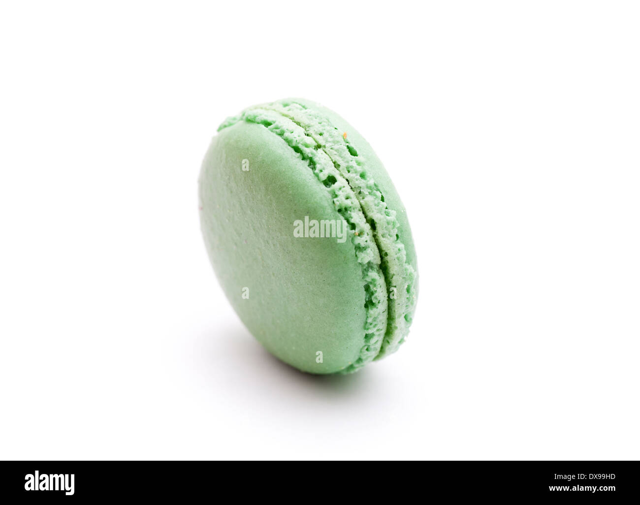Green macaroon on white Stock Photo