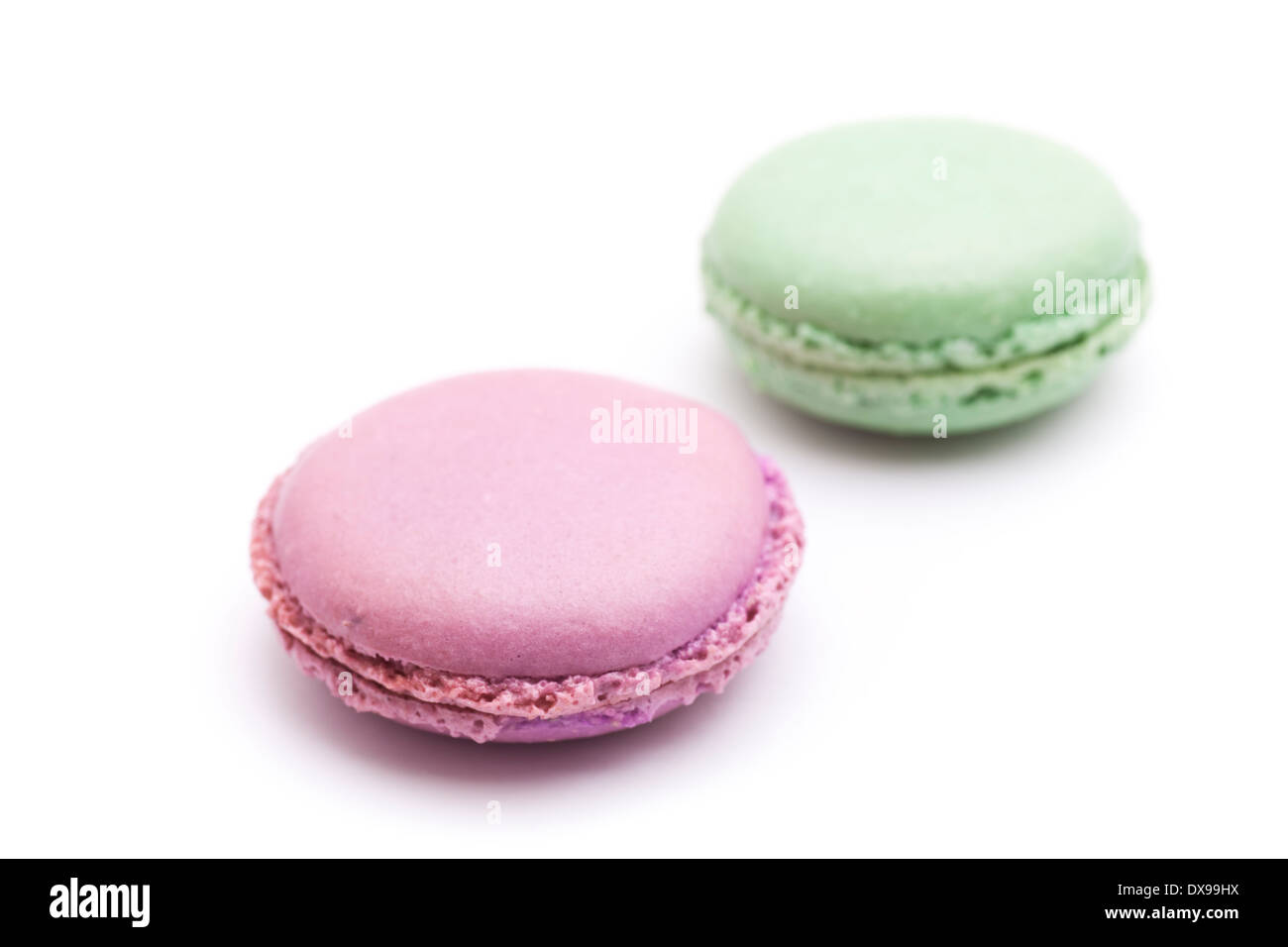 Two macaroons isolated on white background Stock Photo - Alamy