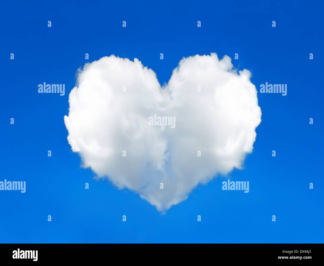 cloud shaped heart in the perfect blue sky. Valentine's Day concept ...