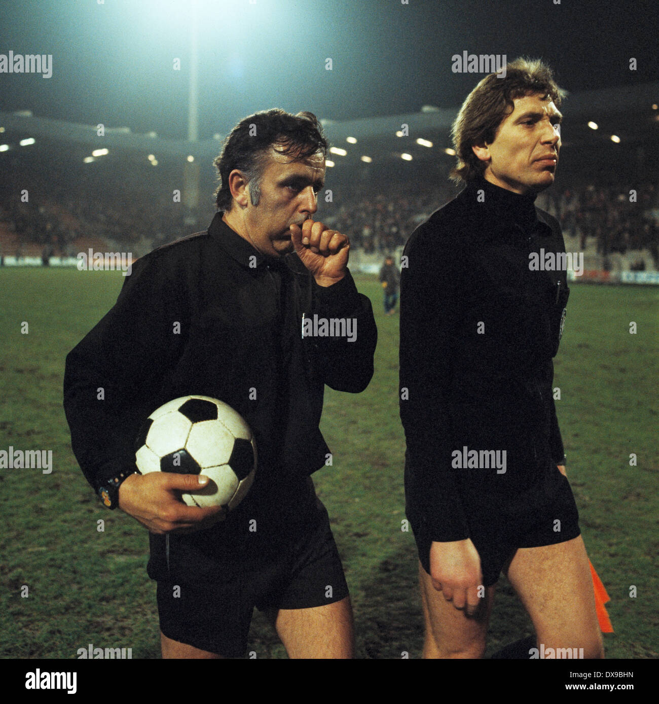 football, Bundesliga, 1979/1980, Ruhrstadion, VfL Bochum versus Fortuna Duesseldorf 0:0, end of the game, leaving, referee Dieter Dreher (left) and assistant Stock Photo