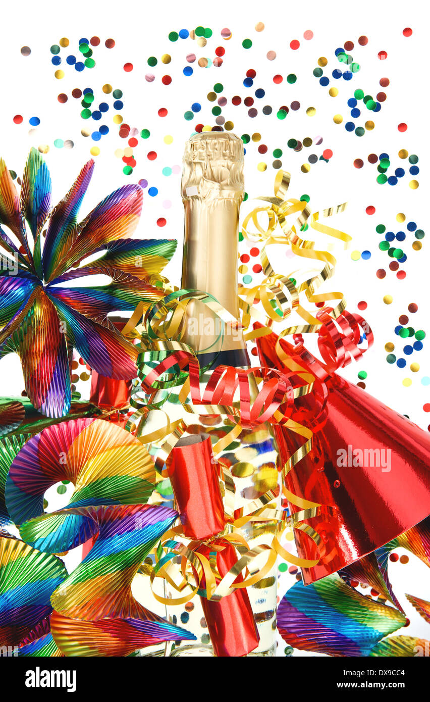 colorful party decoration with garlands, streamer, cracker, confetti and wine bottle. holidays