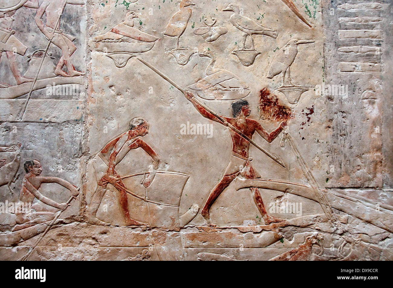 Relief in mastaba Kagemni in Saqqara necropolis:men hunter birds and fish Stock Photo