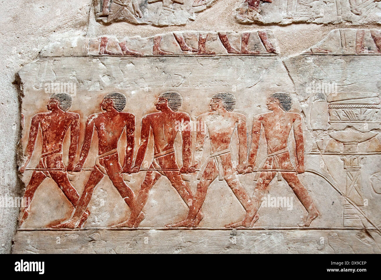 Relief in mastaba of Kagemni in Saqqara necropolis: men at work Stock Photo