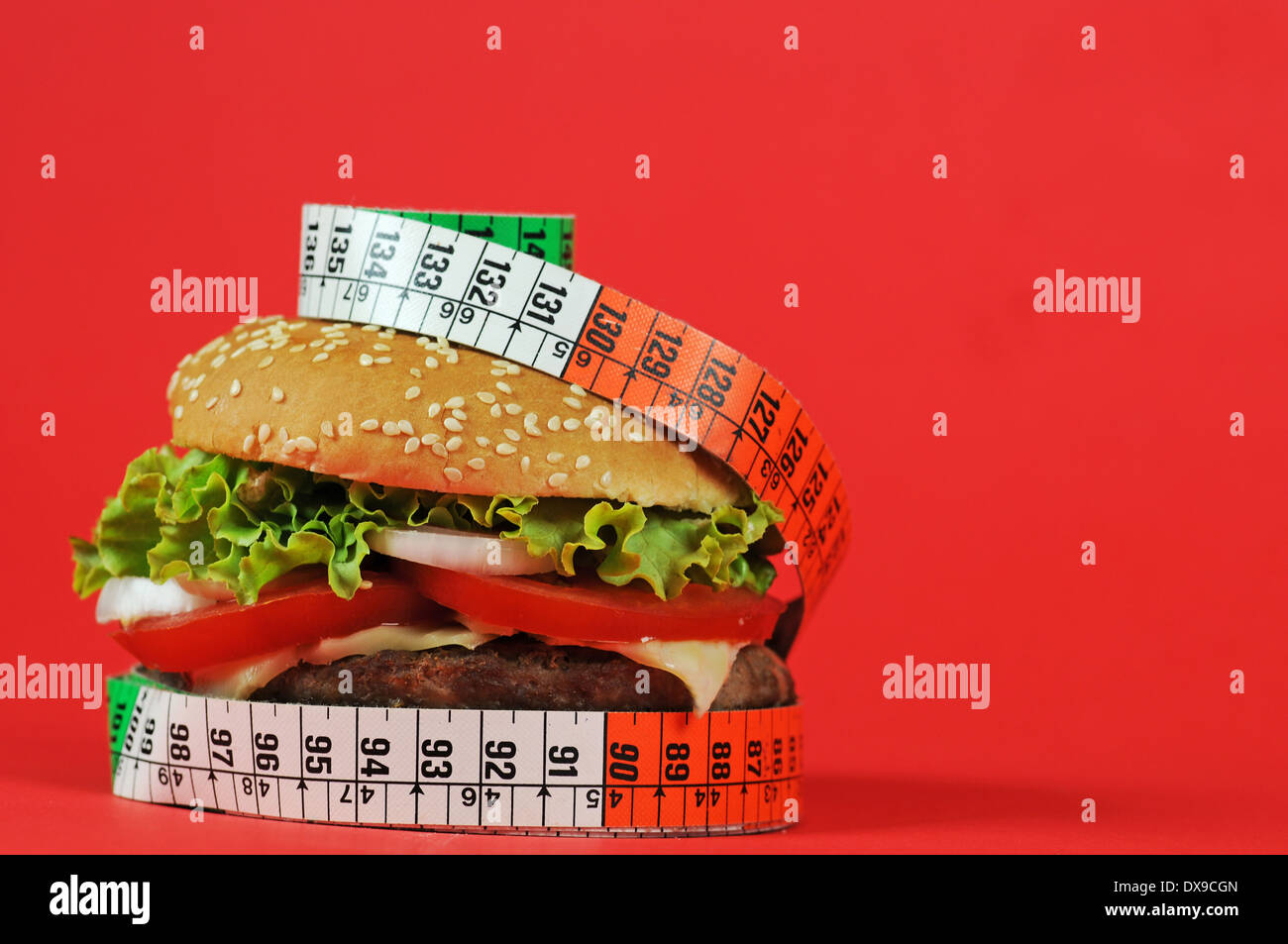Hamburger ,Cheeseburger with tape measure Stock Photo - Alamy