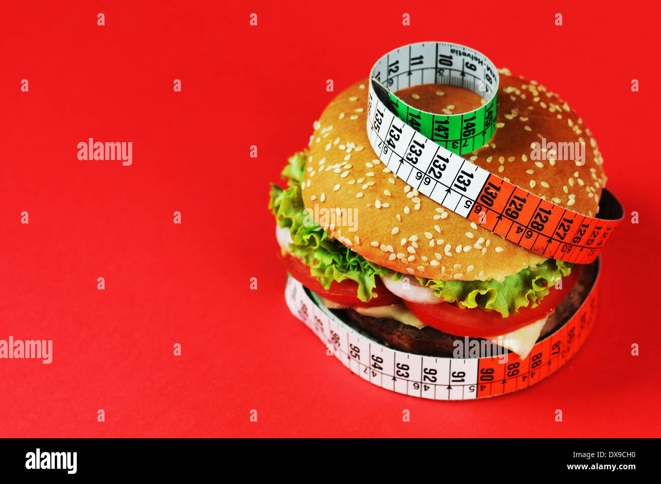 Hamburger ,Cheeseburger with tape measure Stock Photo
