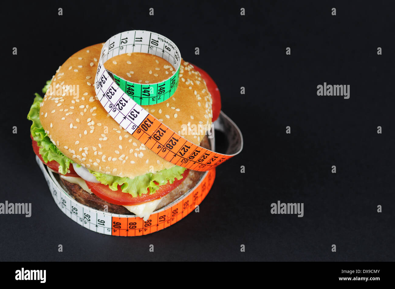 Hamburger ,Cheeseburger with tape measure Stock Photo - Alamy