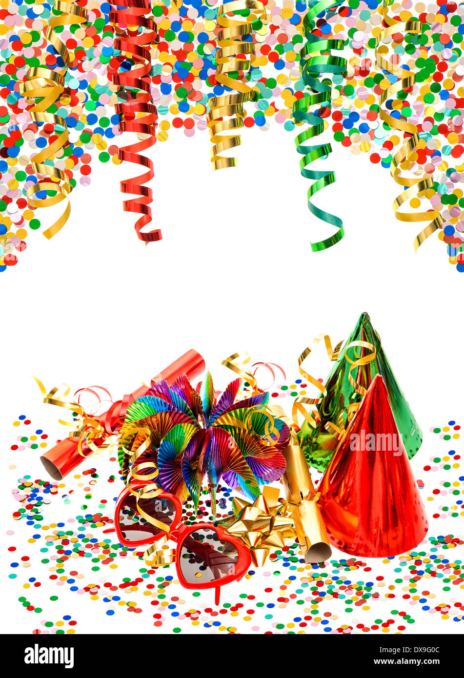 colorful decoration with garlands, streamer, cracker, party glasses and confetti. festive accessory background Stock Photo