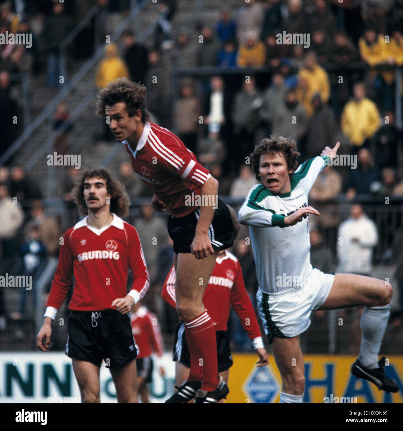 football, Bundesliga, 1980/1981, Stadium am Boekelberg, Borussia Moenchengladbach versus 1. FC Nuremberg 1:4, scene of the match, f.l.t.r. Horst Weyerich (FCN), team leader Norbert Eder (FCN), Carsten Nielsen (MG) Stock Photo