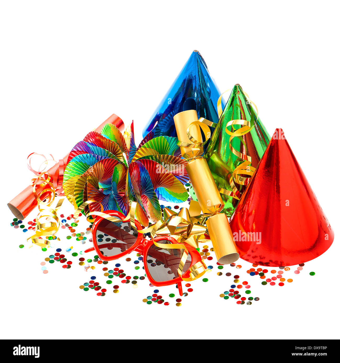 confetti, garlands, streamer, cracker, party glasses on white background Stock Photo