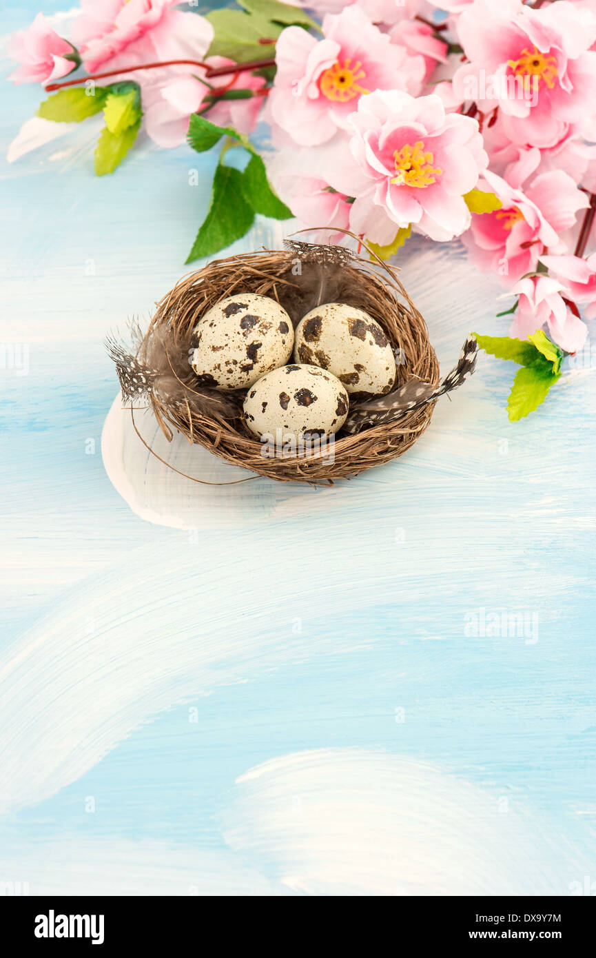 Easter decoration with flowers and eggs in nest Stock Photo - Alamy