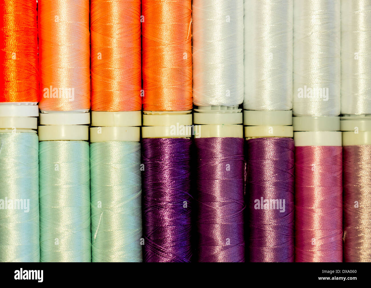 Colored spools of threads Stock Photo - Alamy