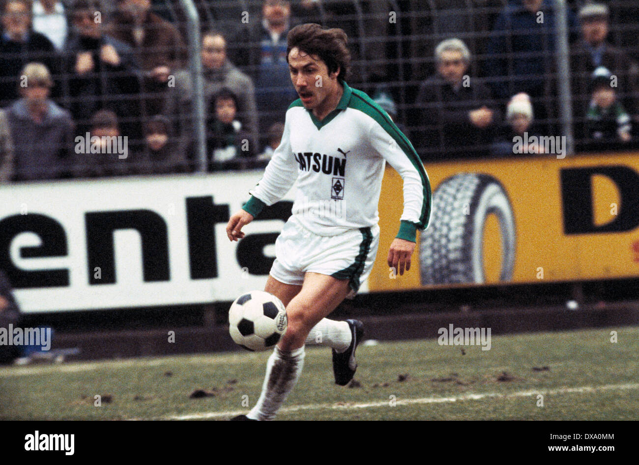 football, Bundesliga, 1981/1982, Stadium am Boekelberg, Borussia Moenchengladbach versus Borussia Dortmund 0:1, scene of the match, Wolfram Wuttke (MG) in ball possession Stock Photo