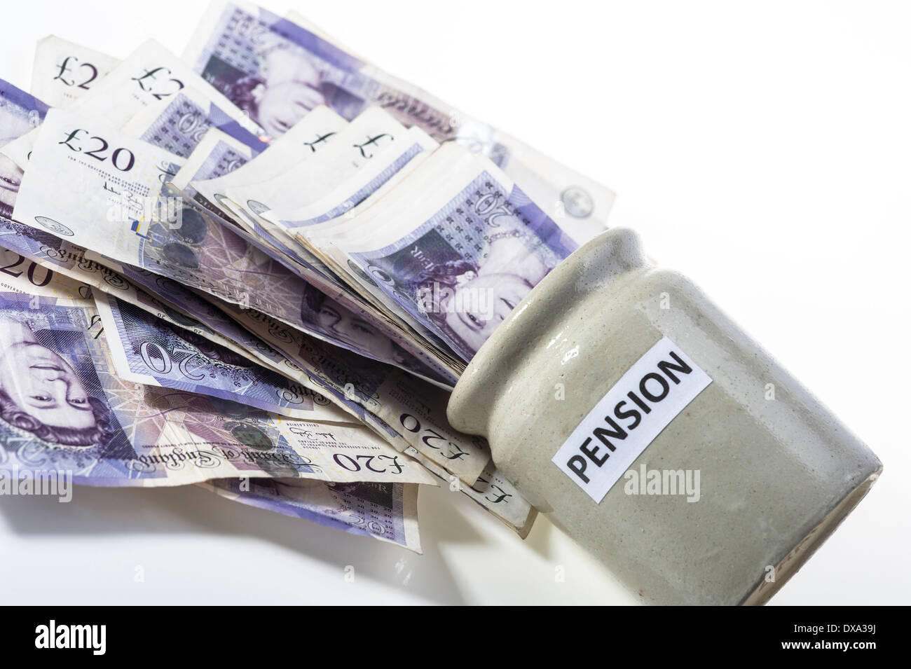 Money spilling out of pension pot. Stock Photo