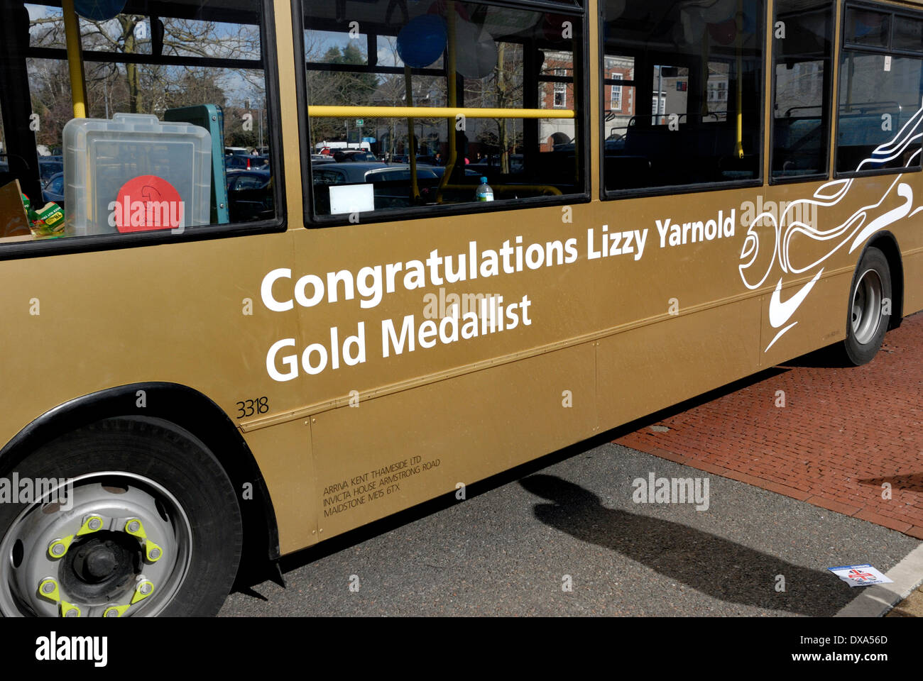 Lizzy Yarnold Victory Parade in Sevenoaks, Kent. 21/03/2014. Local bus painted gold Stock Photo