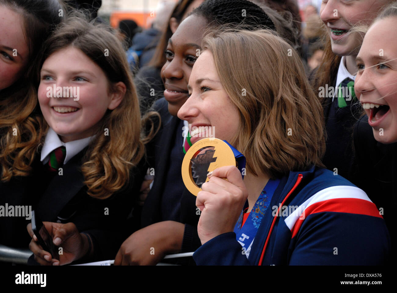 Lizzy Yarnold Victory Parade in Sevenoaks, Kent. 21/03/2014. Winter Olympic gold medal winner Lizzy Yarnold driven from Sevenoaks to her home village of West Kingsdown in Kent in an open-top bus. Stop-off in Blighs Meadow to meet local school children Stock Photo