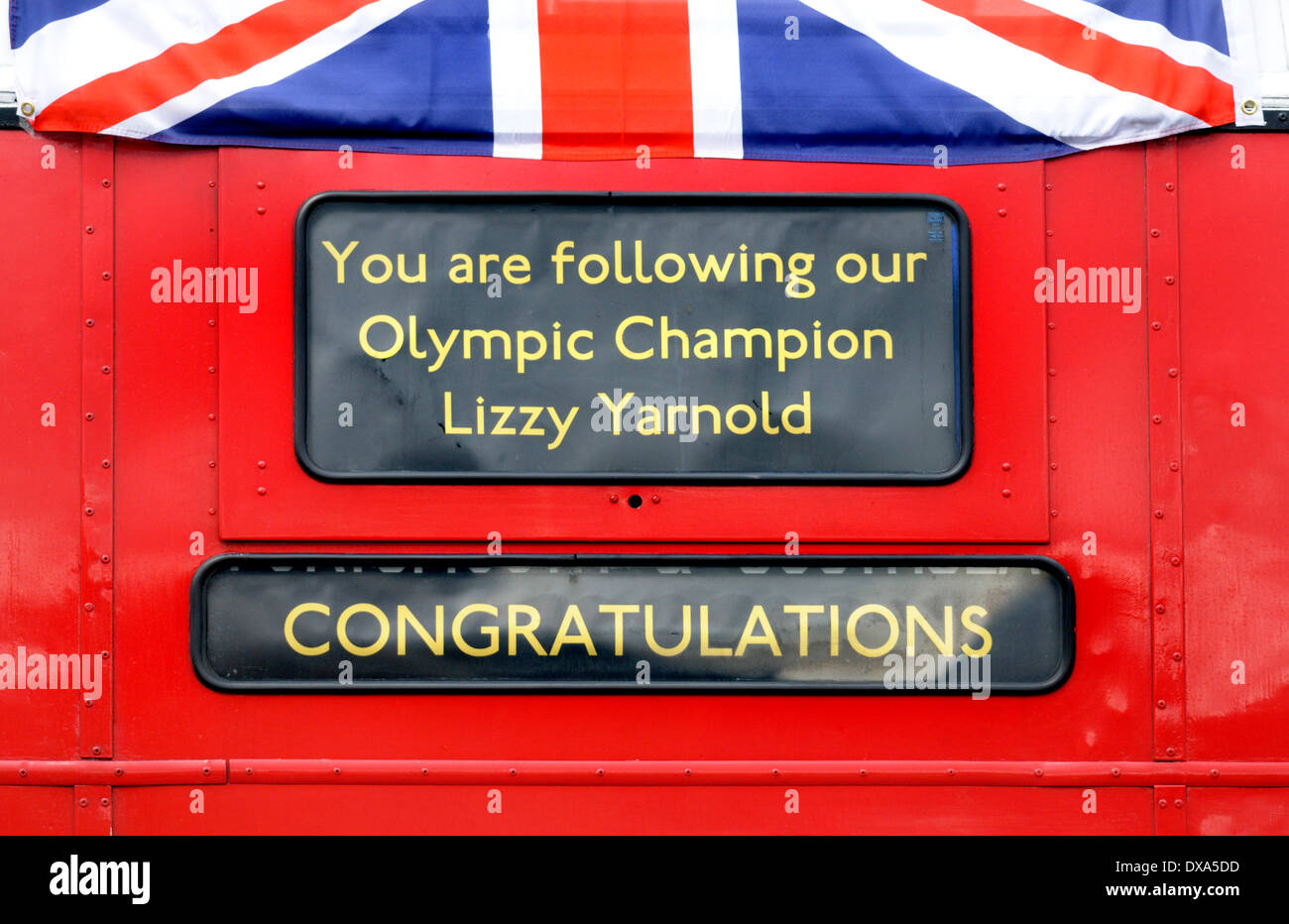 Lizzy Yarnold Victory Parade in Sevenoaks, Kent. 21/03/2014. Winter Olympic gold medal winner Lizzy Yarnold driven from Sevenoaks to her home village of West Kingsdown in Kent in an open-top bus. Open top bus with special message Stock Photo