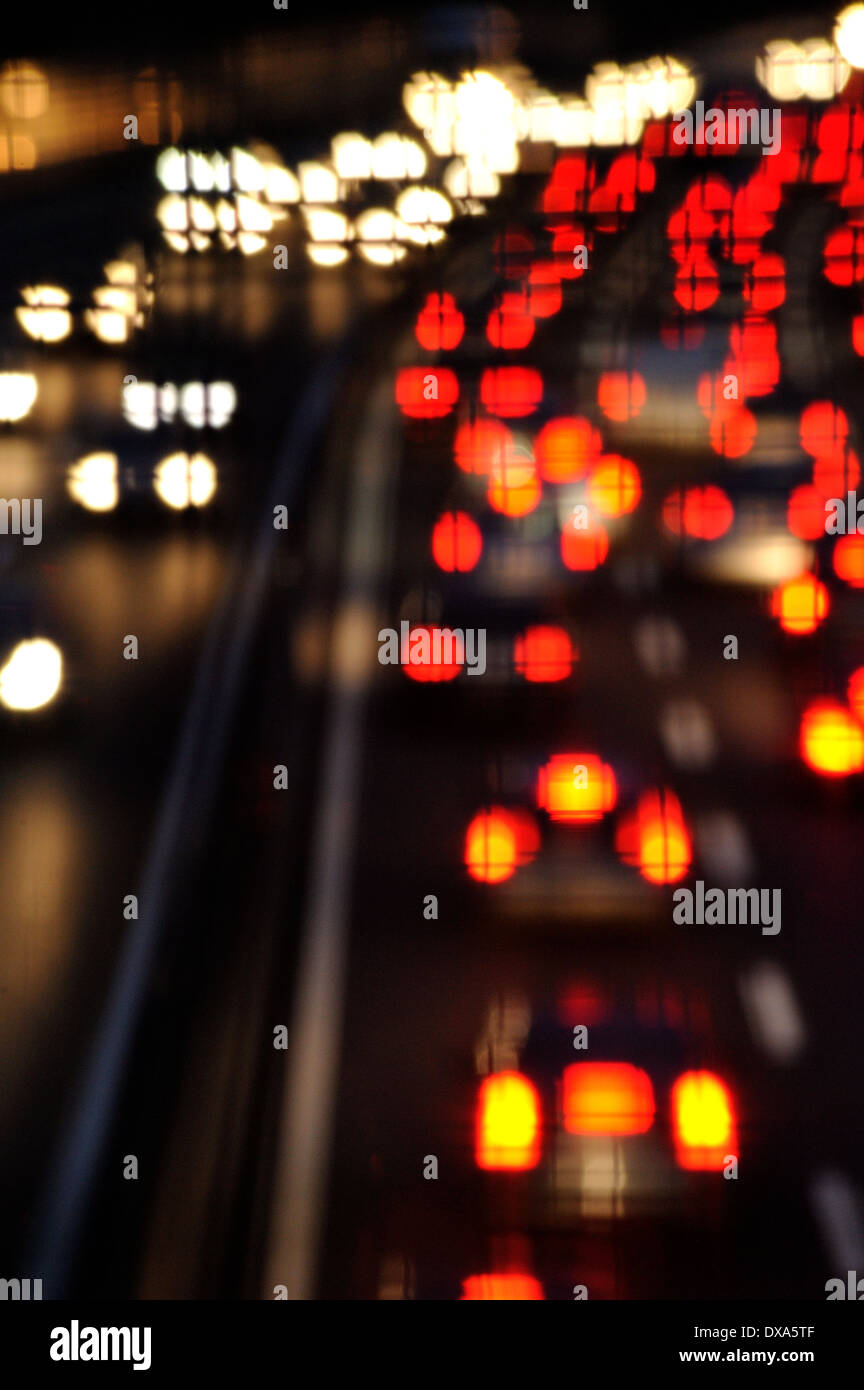 Unfocused red and white circle car lights in the night. Stock Photo