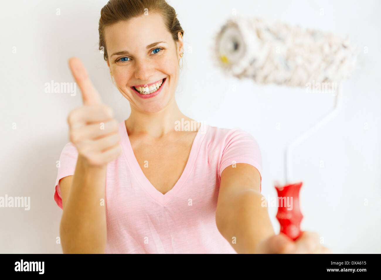 Portrait woman showing thumb hi-res stock photography and images - Alamy