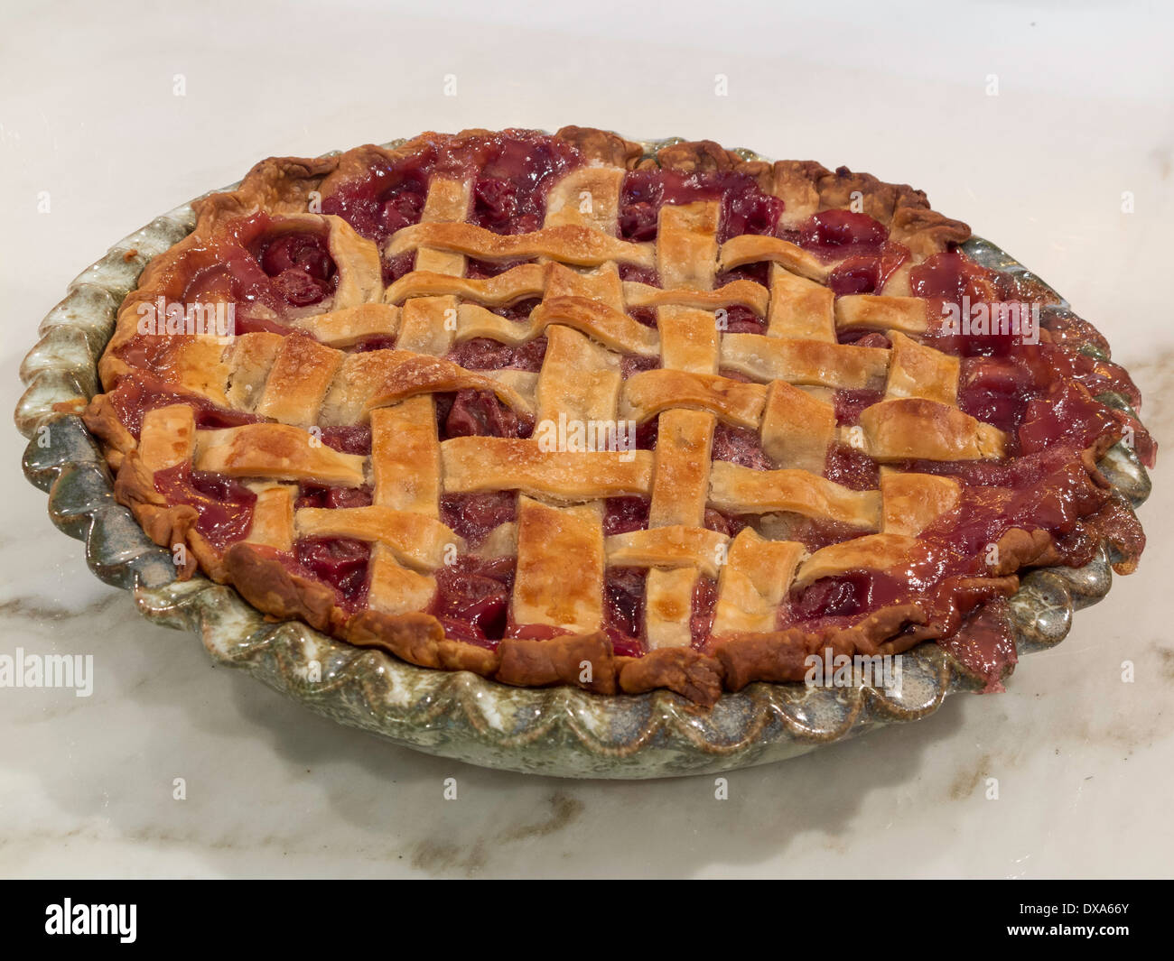 Homemade Cherry Pie on Kitchen Counter Stock Photo