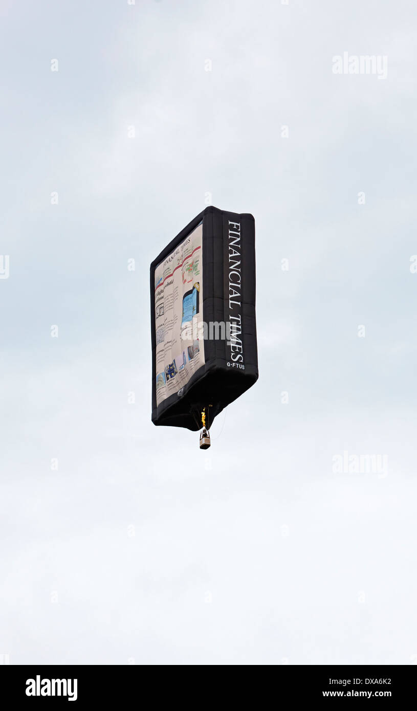 Financial Times "Tablet" Balloon at the 35th UK Bristol balloon fiesta at the Ashton court estate evening launch Stock Photo
