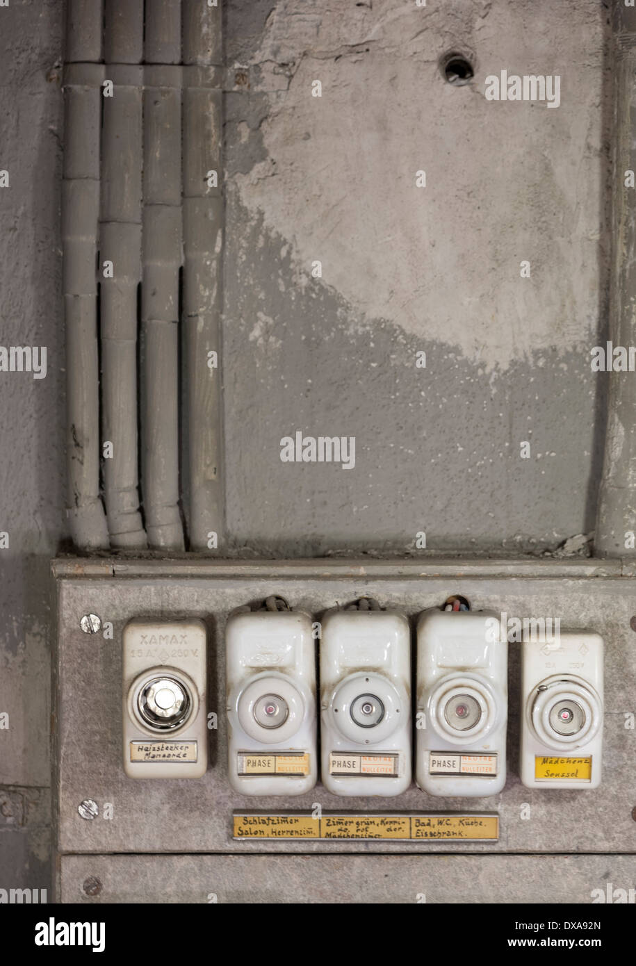 Close-up of an array of old-fashioned lead fuses in a household fuse-box (Swiss model, built around the 1970ties) Stock Photo